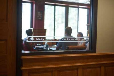 A picture of the Norwood reading room with a meeting in progress