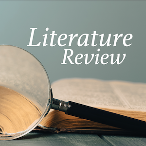 Literature Review. Magnifine glass enhacning text from an open book
