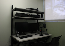 Audio room with computer, mic and other equipment