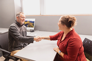 Two people shaking hands